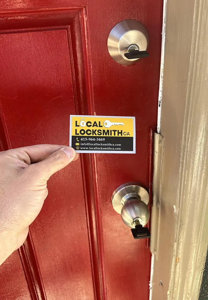 Deadbolt on a red front door after a lockout